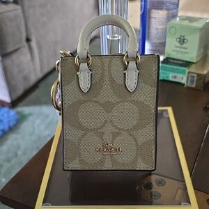 COACH Mini Tote Bag Charm in Neutral Signature Canvas with Cream Handles